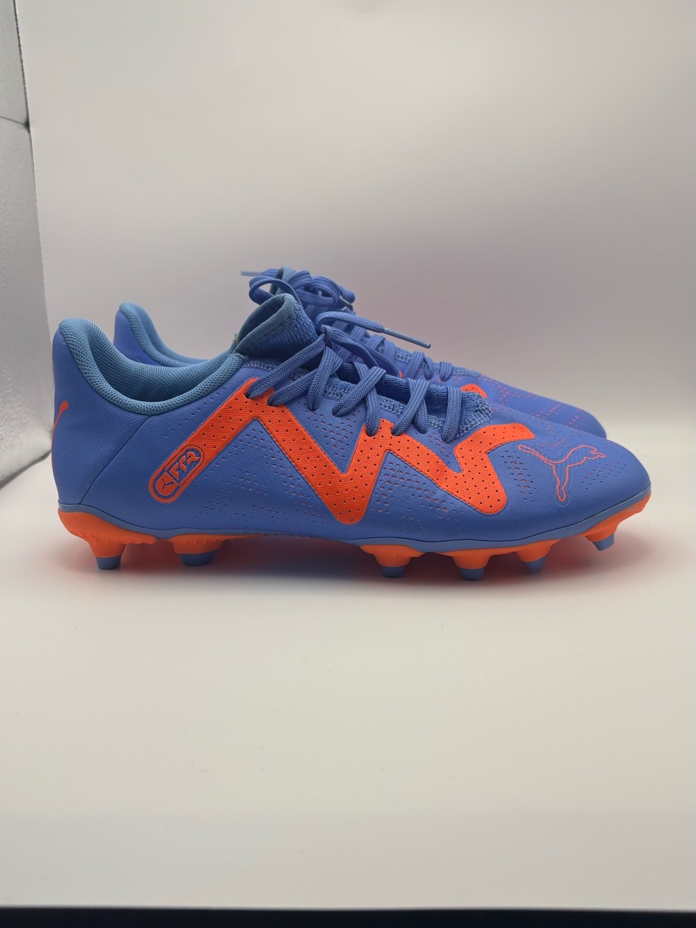 Puma Light Blue with Orange Accent Soccer Cleats